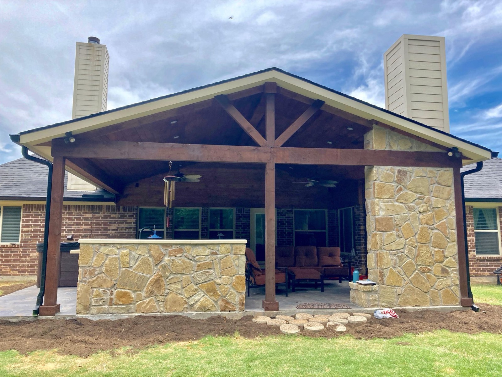 Finished covered outdoor living space by Legado Outdoor Living